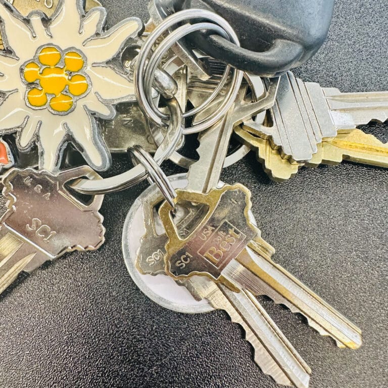 set of keys with colorful keychain